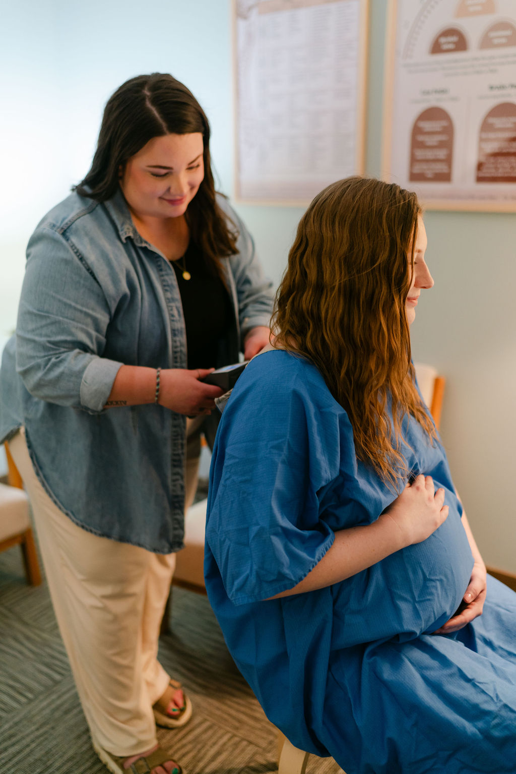 a pregnant mom getting neurological scans to see how her nervous system is regulating with her baby's